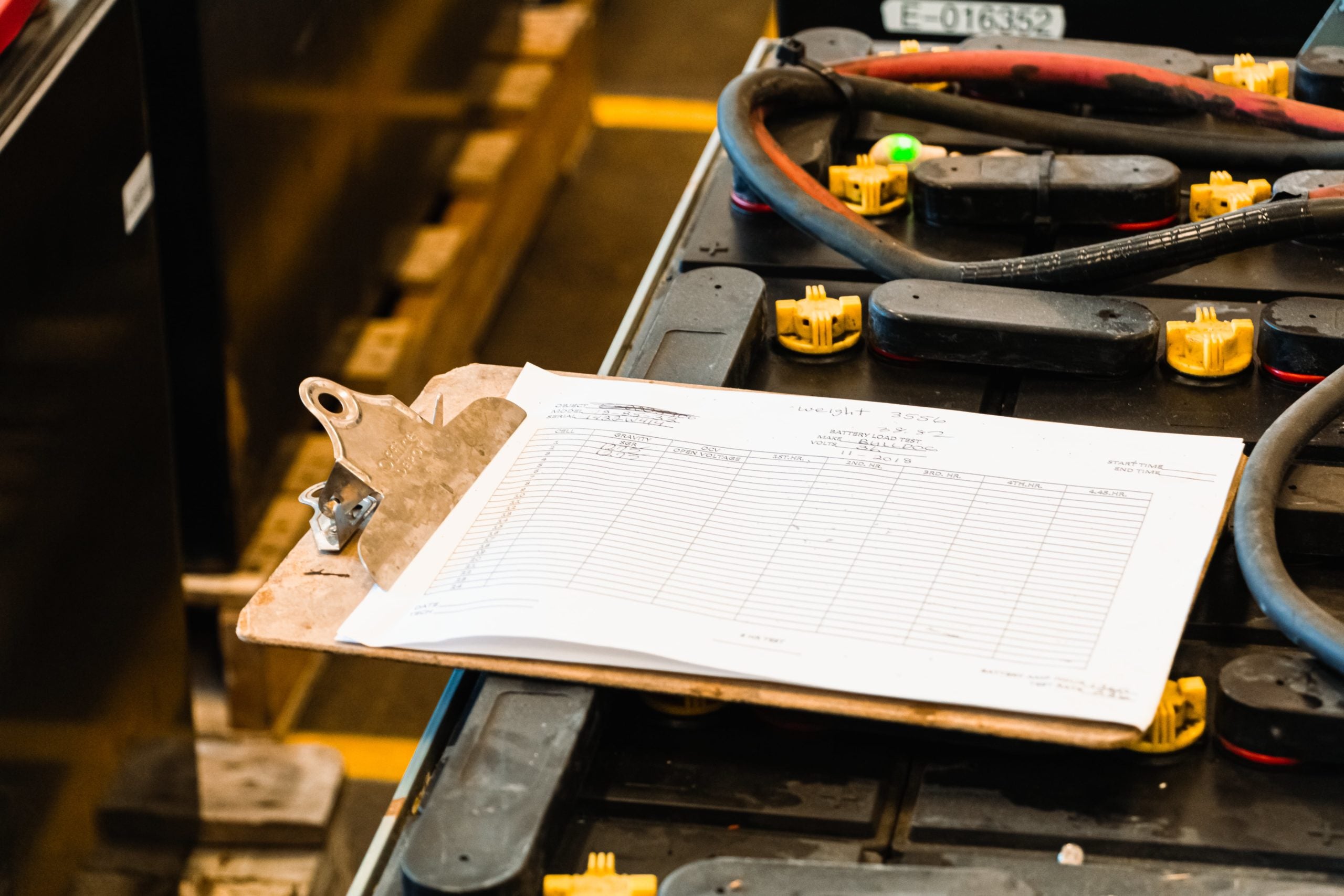 Forklift battery inspection in progress